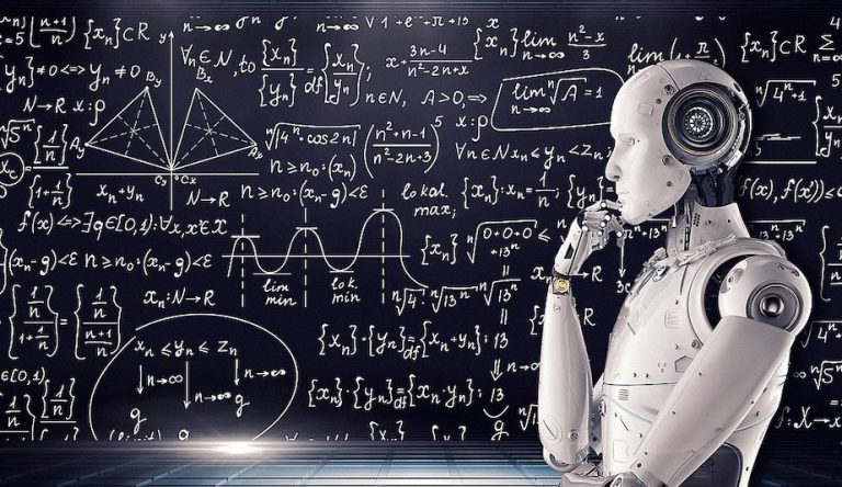 A robot stands in front of a blackboard filled with equations. Photo by Photo by Mike MacKenzie, from Flickr