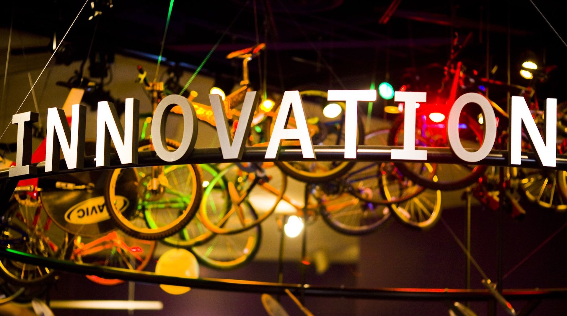 An Innovation sign hangs in a bike shop. News companies are using discovery processes and frameworks to deliver innovative products.