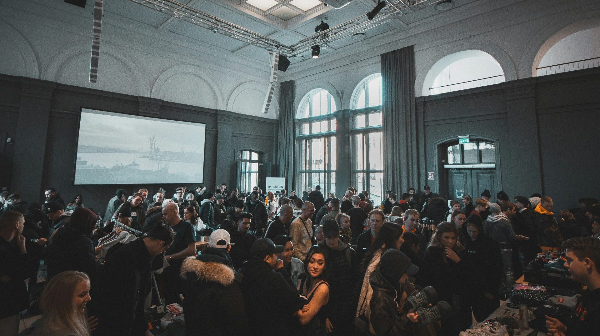 A crowded conference room. Events and experiences are proving to be a bright spot during tough times for publishers and digital media outlets. Photo by Jakob Dallbjorn from Unsplash.